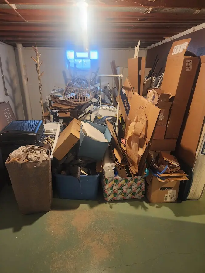 Roll-off dumpster container at job site for 2 Yard Dumpster Rental in Newbury